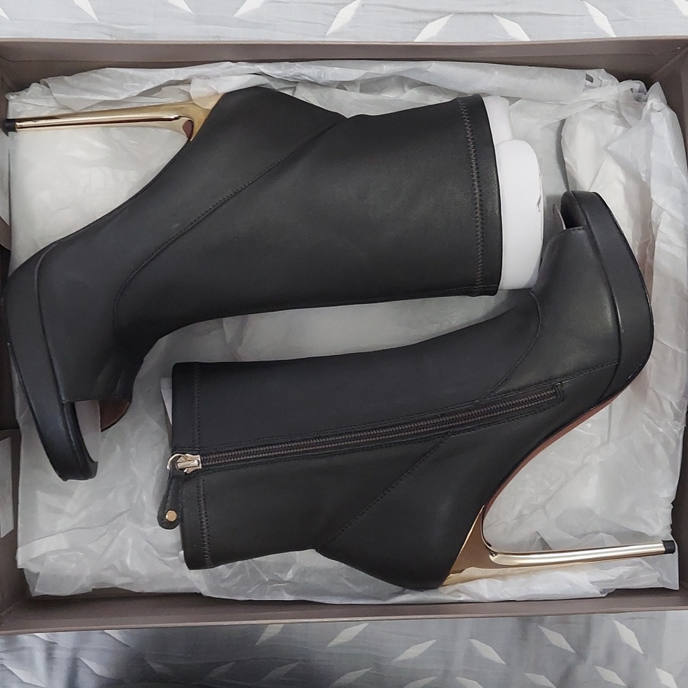 BCBGMaxAzria Black Peep-Toe Stiletto Booties with Gold Heels